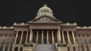 Magic Media Full-Cycle Development, A nighttime view of a majestic capitol building, featuring a prominent dome and classical columns.