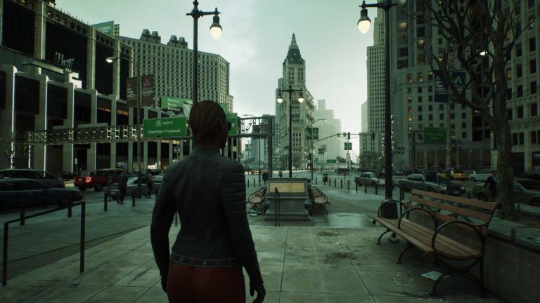 Magic Media Unreal Engine 5 game development, a person gazes down a city street leading to a clock tower, with overcast skies above and scattered pedestrians and cars.